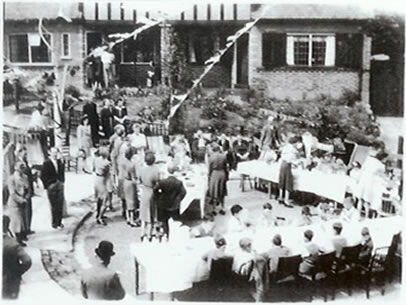 VE DAY CELEBRATION IN VALLEY AVENUE, PAUL SMYTH CENTRE OF PICTURE IN DARK SUIT.